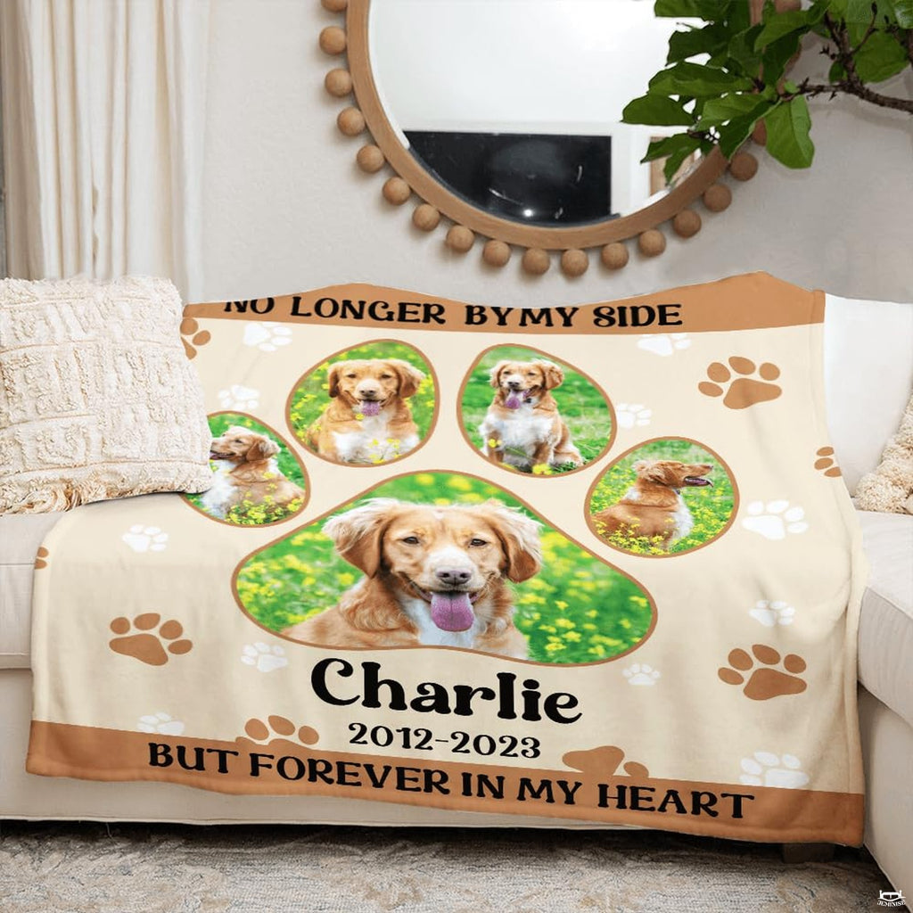 Bedroom setting displaying dog memorial throw blanket spread across a bed beside a puppy.