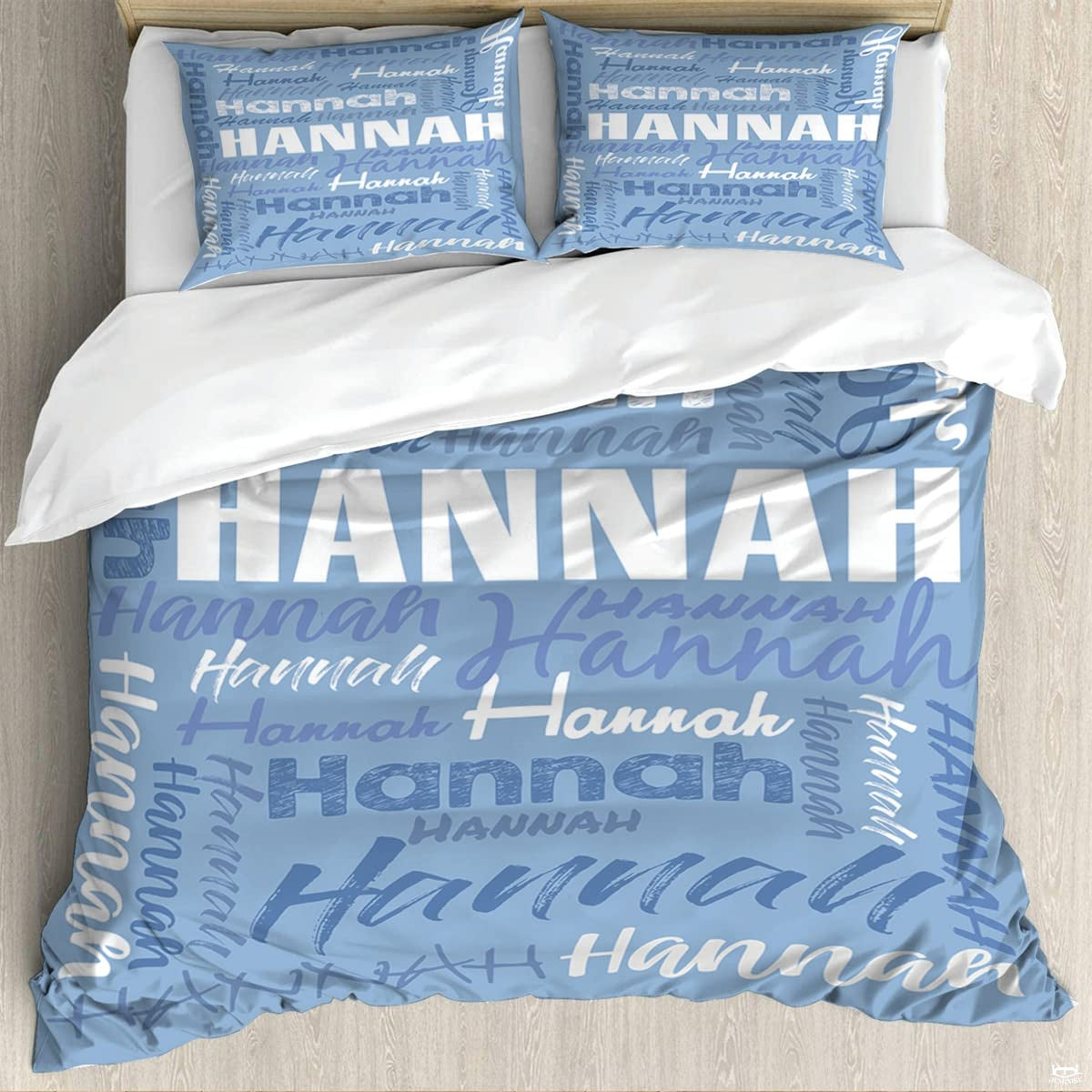 Periwinkle typography bedding featuring an interlocking word collage of block and script lettering on slate backdrop