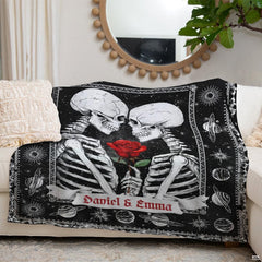 Gothic bedroom arrangement featuring celestial skeleton lovers artwork with intricate planetary accents.