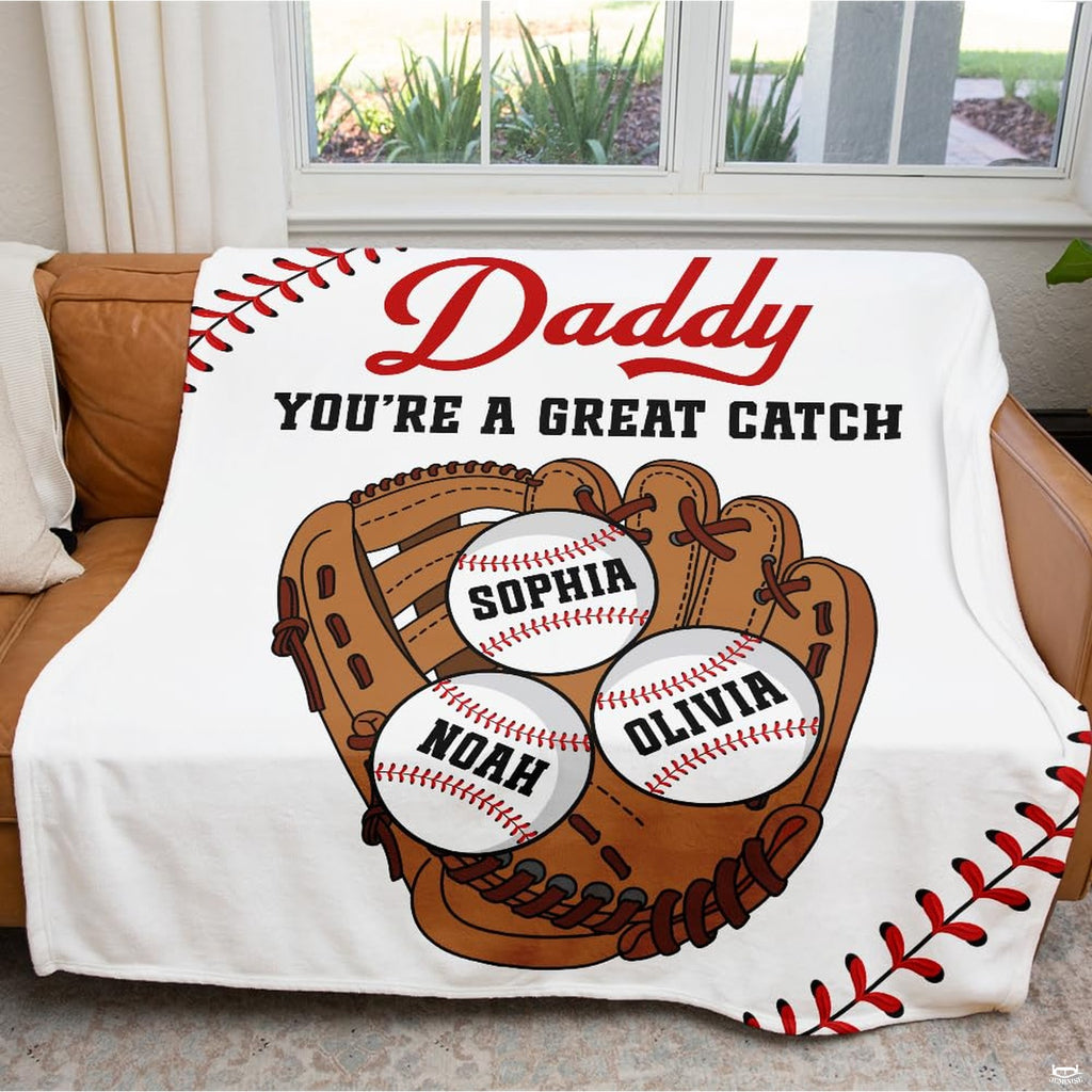 Folded throw blanket presentation highlighting red corner baseball seam graphics.