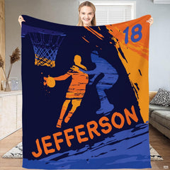 Close-up of distressed basketball hoop graphic with vivid royal blue and orange brush textures.