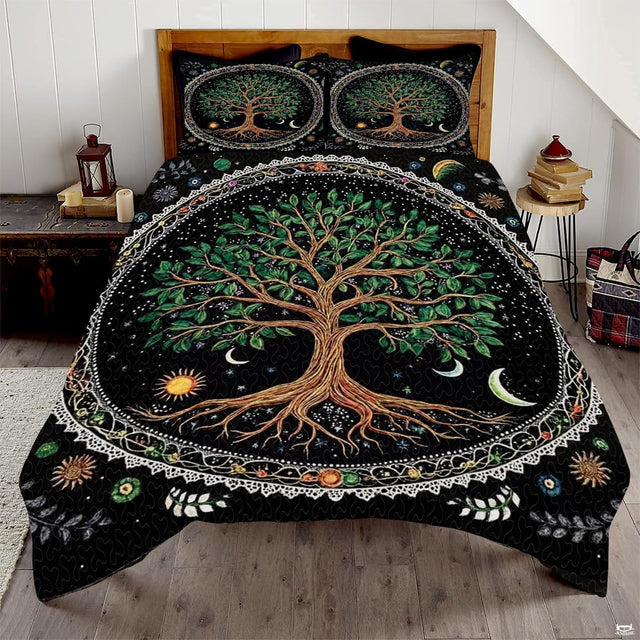 Tree of life bedding set displaying lush green leaves and celestial moons against dark backdrop.