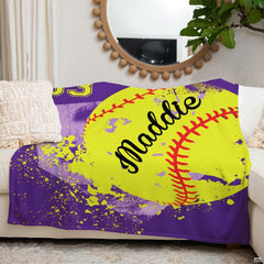 Bedroom interior display showing purple softball throw blanket styled on modern accent seating