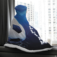 Profile perspective display of blue soccer net graphic shown near an urban high-rise window.