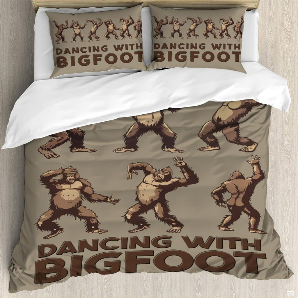 Full bedroom display of dancing Bigfoot bedding styled with outdoor cabin room decor accents