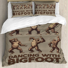 Full bedroom display of dancing Bigfoot bedding styled with outdoor cabin room decor accents