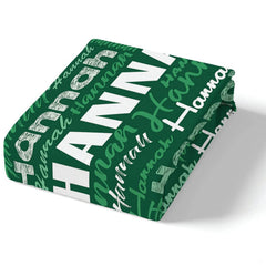Corner fold view of typography bedding highlighting sharp green and white graphic printing