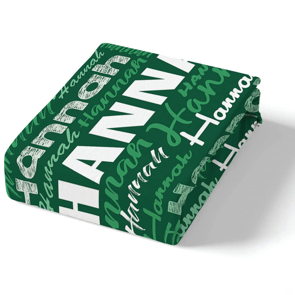 Corner fold view of typography bedding highlighting sharp green and white graphic printing