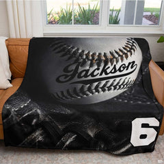 Monochrome studio still-life of a baseball inside a black fielder glove with dramatic lighting, view 5.