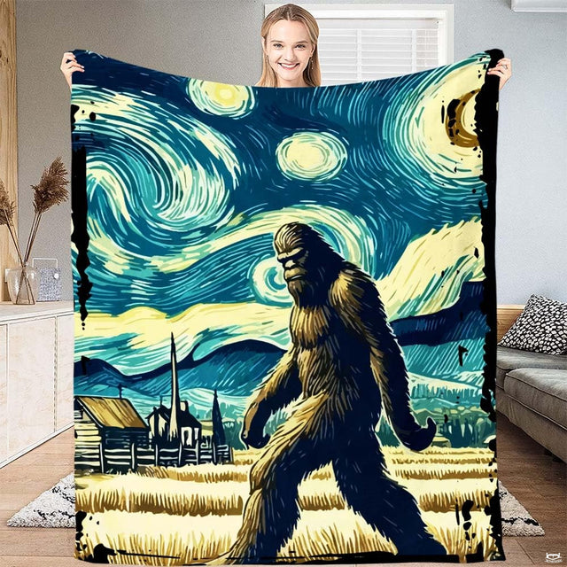 Woman holding up Bigfoot blanket showcasing Starry Night painting inspired sky