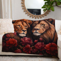 Moody romantic living room setting featuring floral lions throw blanket on dark couch