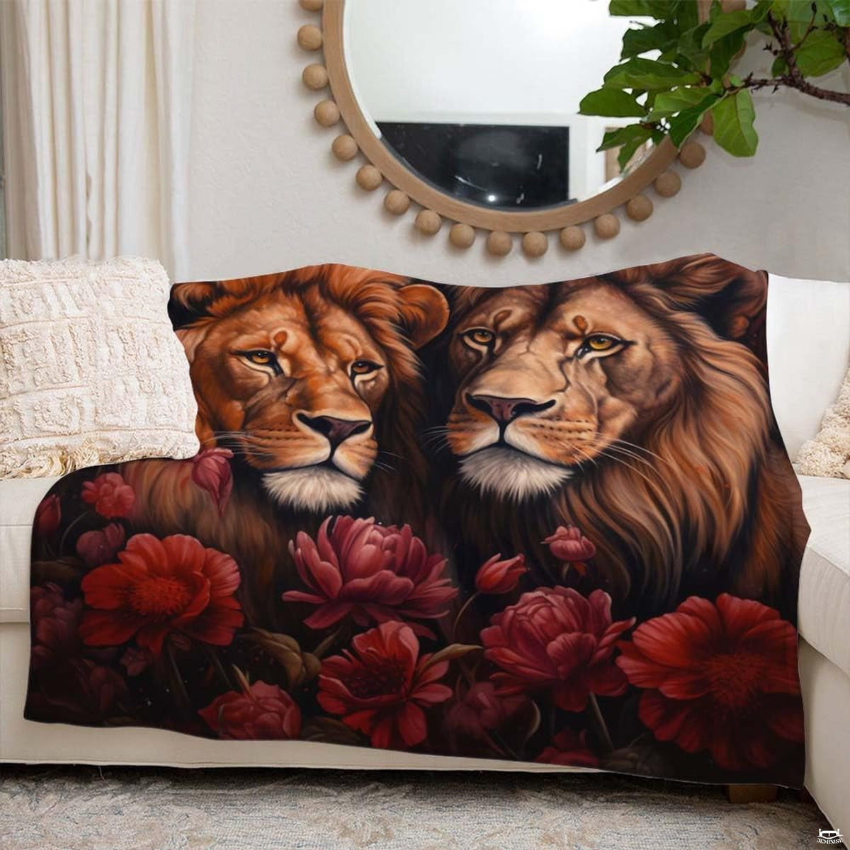 Moody romantic living room setting featuring floral lions throw blanket on dark couch