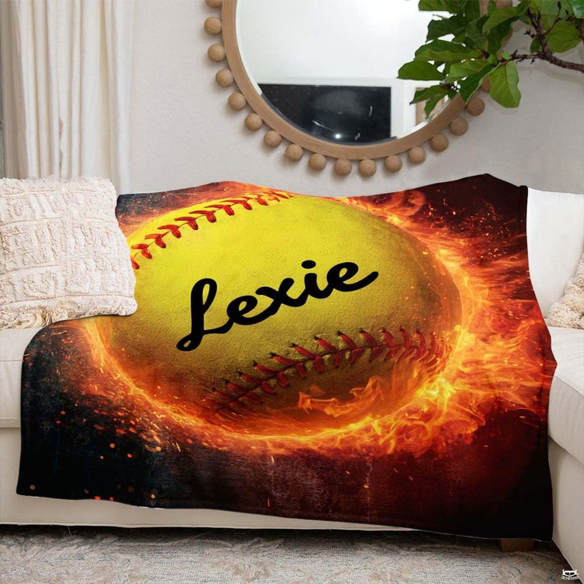 Sports fan holding fiery softball inferno graphic blanket