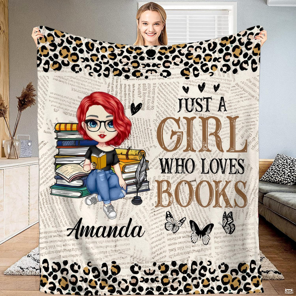 Charming room display featuring newsprint reader girl throw blanket arranged in a reading corner.