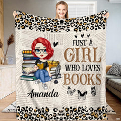 Charming room display featuring newsprint reader girl throw blanket arranged in a reading corner.