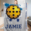 thematic accent sports bedding set featuring stylized yellow ball graphic and vivid blue paint splatters.