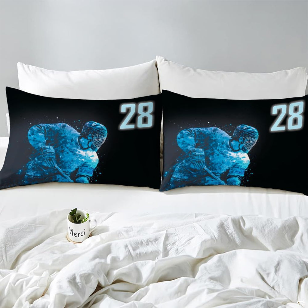 Side angle view of athletic winter sports bedding showing dark slate navy and black tones on mattress