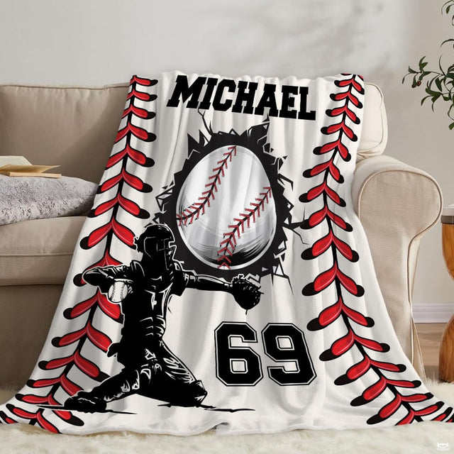 Sports theme crib bedding displaying bold baseball graphic and collegiate jersey typography.
