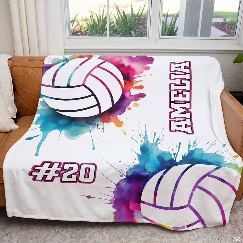 Modern bedroom styling displaying colorful volleyball watercolor splatter graphic decor.