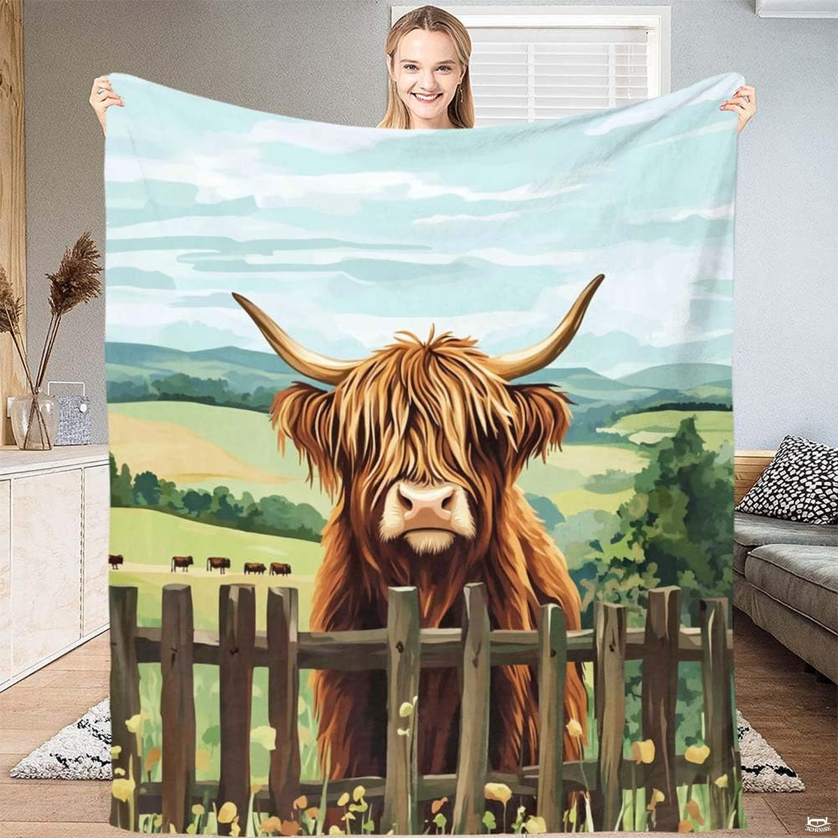 Rustic farmhouse bed display with painted Highland cow illustration, yellow meadow wildflowers, and rolling pastures.