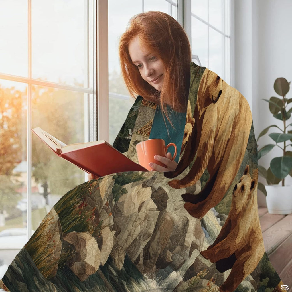 Woman reading book by sunlit window wrapped in grizzly bear throw blanket