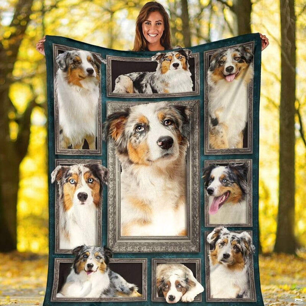 Outdoor view of a model holding up the full Australian Shepherd gallery throw blanket.