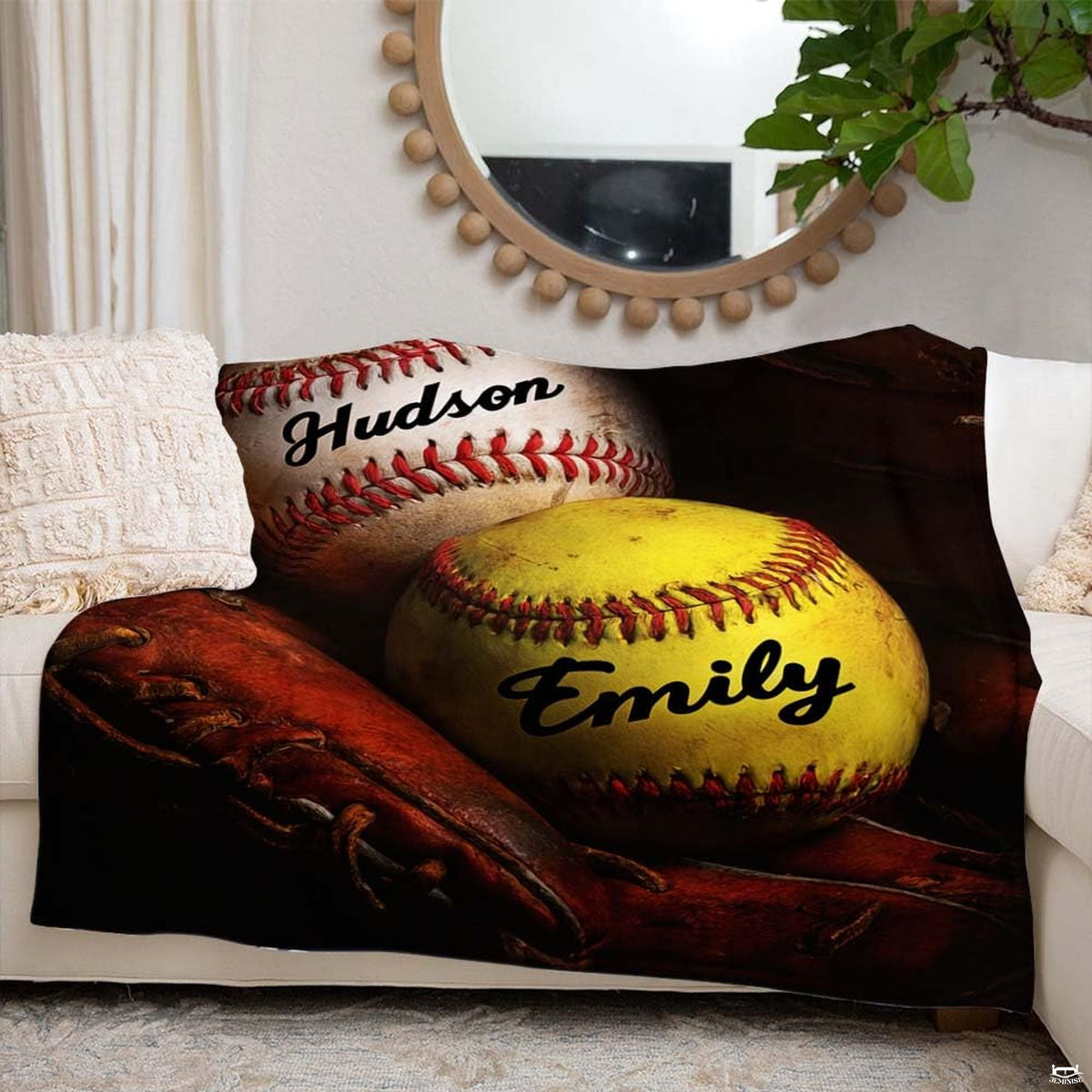 Baseball and softball athletic blanket styled across living room couch