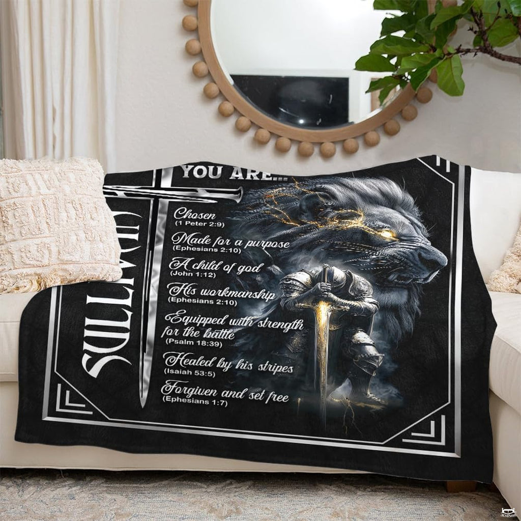 Heroic lion and knight graphic blanket draped over living room sofa