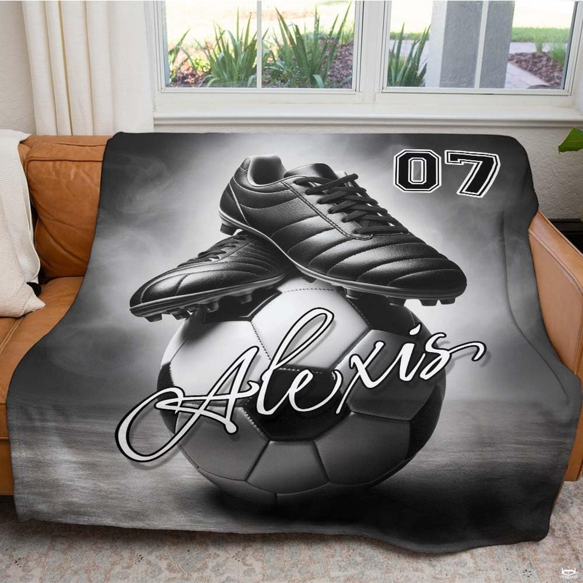 thematic accent display of monochromatic soccer theme showcasing cleats, ball, and dynamic graphic typography.
