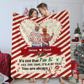 Holiday couple inside candy cane heart frame on diagonal peppermint stripes, view 1.