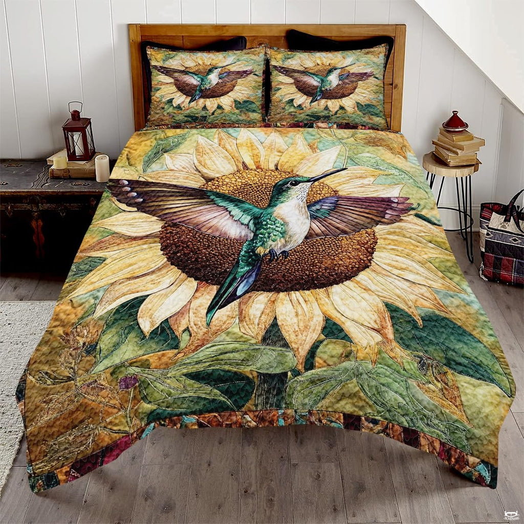 Teal and white hummingbird over a large cream sunflower design