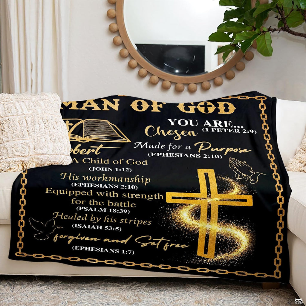 Flat overhead display of Christian scripture golden cross faith blanket layout.