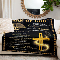 Flat overhead display of Christian scripture golden cross faith blanket layout.