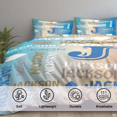 Corner perspective of bedding highlighting vibrant aqua teal and golden sand graphic color printing