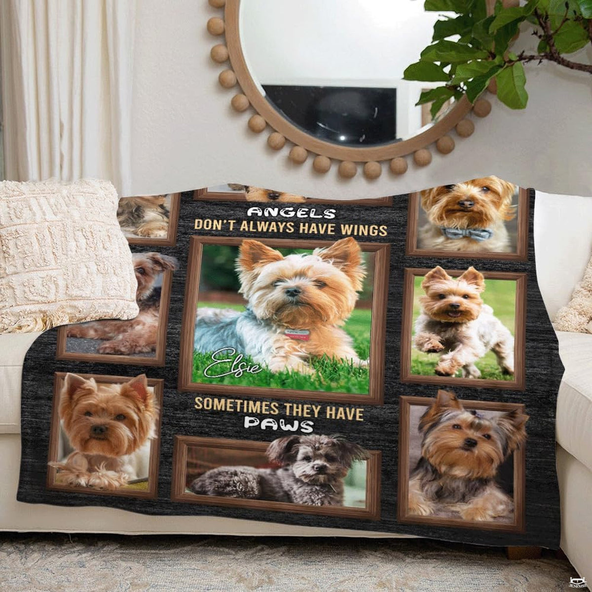 Yorkshire Terrier framed blanket arranged across living room couch.