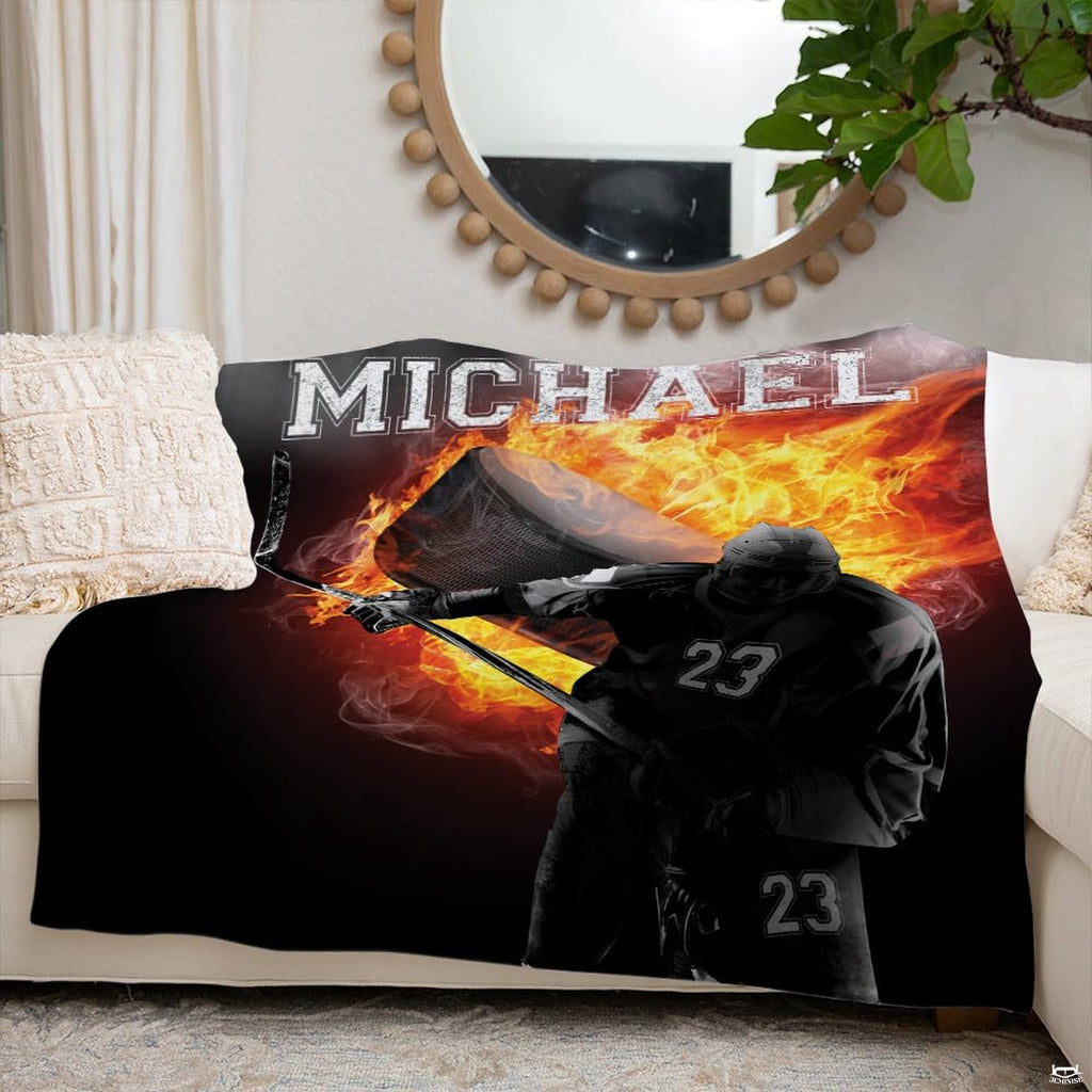 Interior decor presentation showing hockey design arranged on a sofa beneath a round mirror.