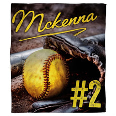 Fastpitch softball infield bat and glove blanket on diamond dirt