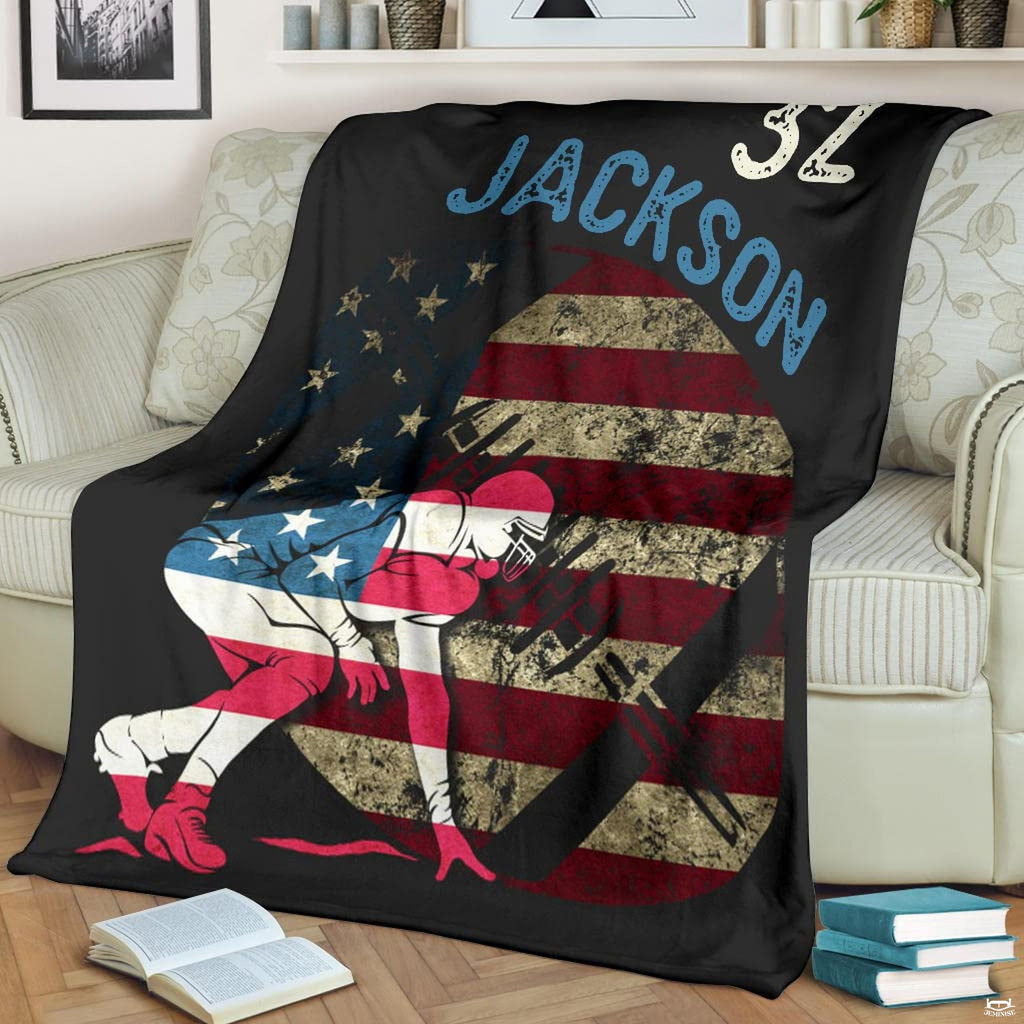 Patriotic gridiron lineman stance football blanket draped over sofa