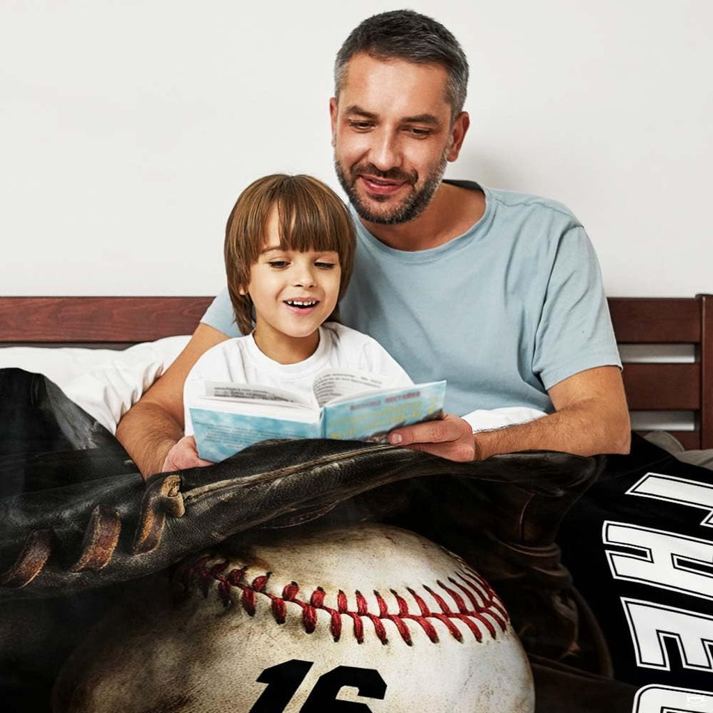 Baseball resting inside a dark fielder glove beside vertical white varsity lettering, view 3.
