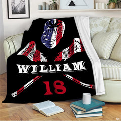 Patriotic lacrosse graphic blanket draped over living room couch