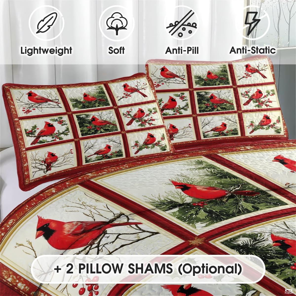 Close-up detail of woodland patchwork bedding displaying stylized cardinal plumage, pine needles, and bark brown accents.