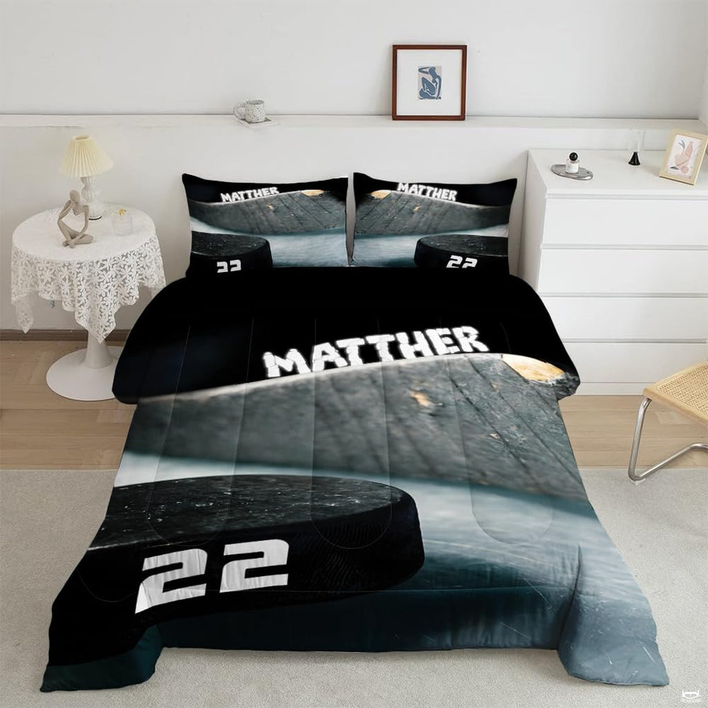 Charcoal and slate ice hockey goalie sports bedding set displayed neatly on a bed in a modern youth bedroom