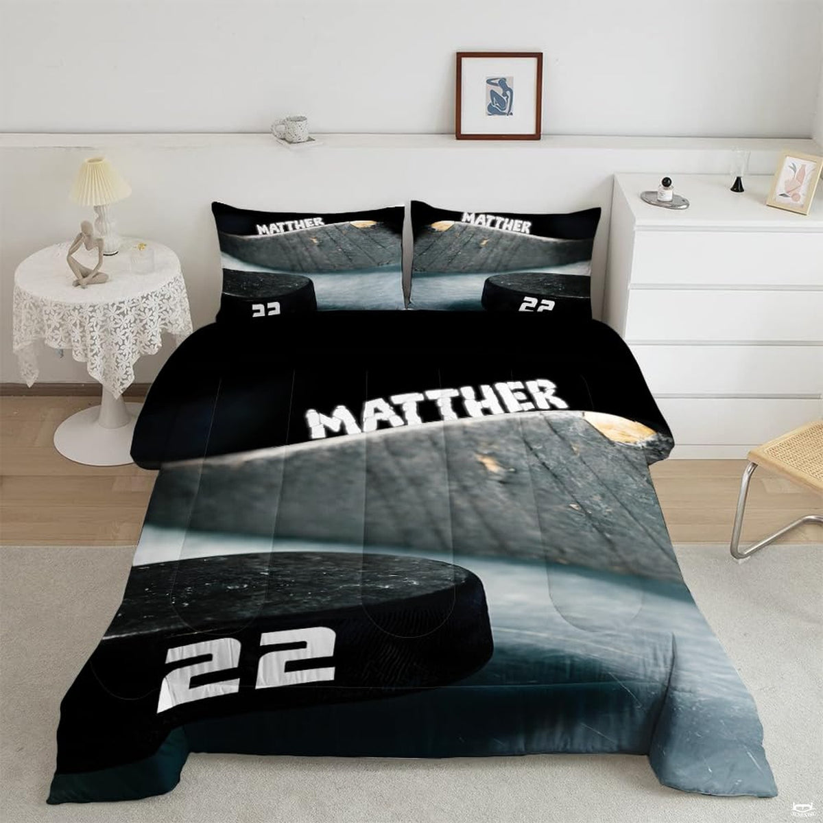 Charcoal and slate ice hockey goalie sports bedding set displayed neatly on a bed in a modern youth bedroom