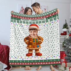 Falling snowflakes and pine tree pattern framing a whimsical gingerbread cookie design