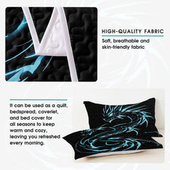 Detail view of cyan dragon graphic on dark bedding with pale reverse side