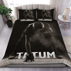 Crimson maroon football sports bedding featuring textured football graphic and yard lines on a bed