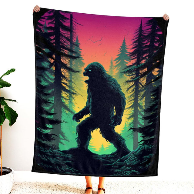 Close-up of graphic Sasquatch linework and colorful sunset gradient sky.