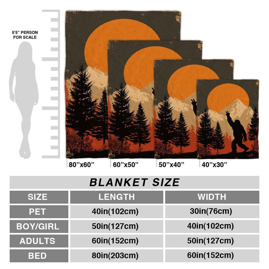 Bigfoot peace sign throw blanket styled across a couch in a rustic living room.