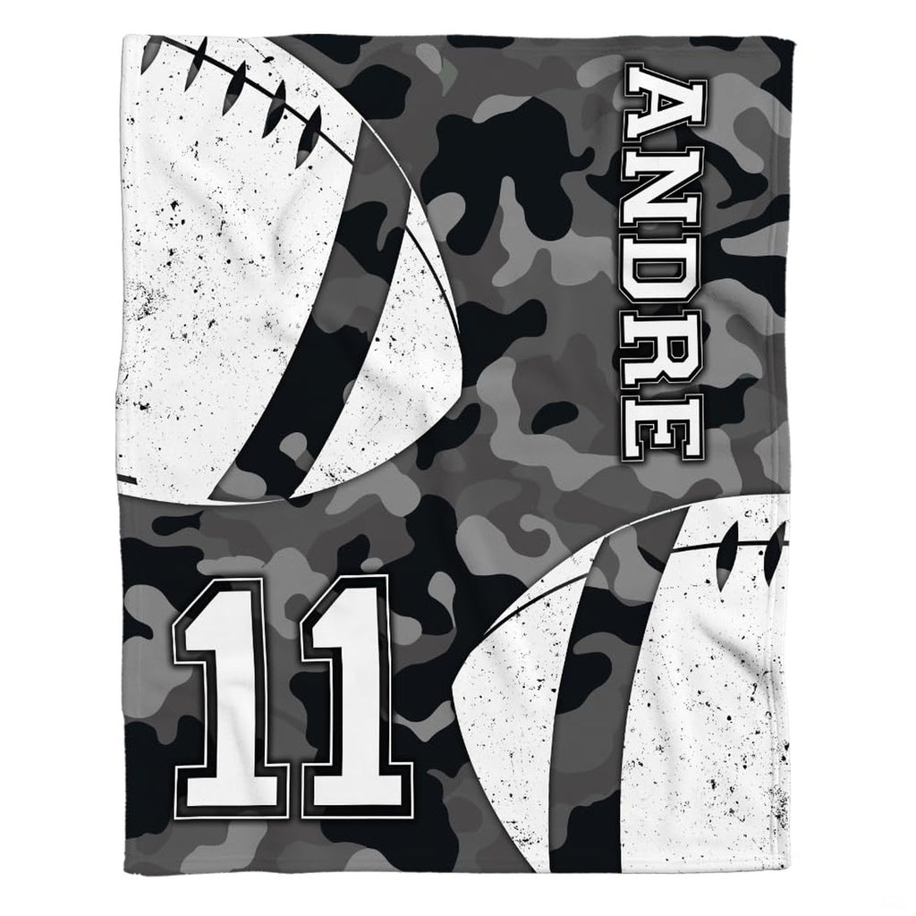 Close-up of distressed football graphics on grey bedding sets single.