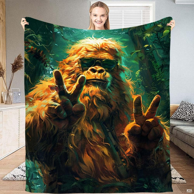 Groovy Bigfoot sunglasses throw blanket featuring cool Sasquatch flashing peace signs in jungle forest